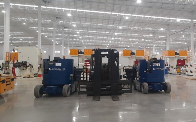Forklift and access lifts staged for the install.