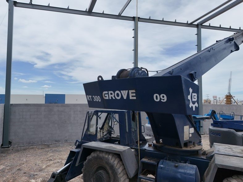 Steel frame going up with our own rough-terrain crane.